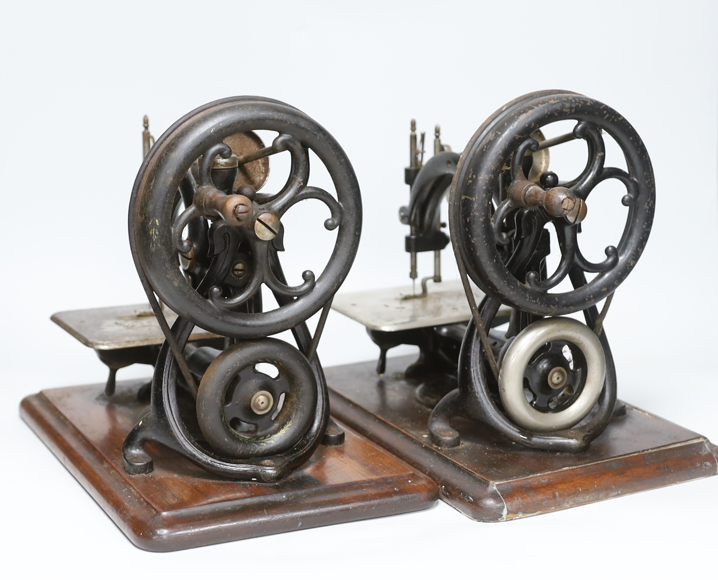 Two Willcox and Gibbs patent sewing machines, each 34cm wide